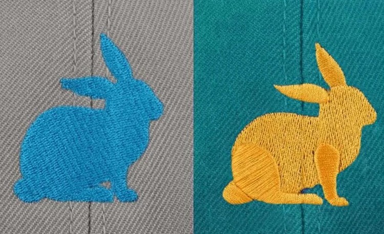 Two embroidered rabbit designs side by side, showing slight differences in stitch style and texture to illustrate how similar designs may digitize differently.